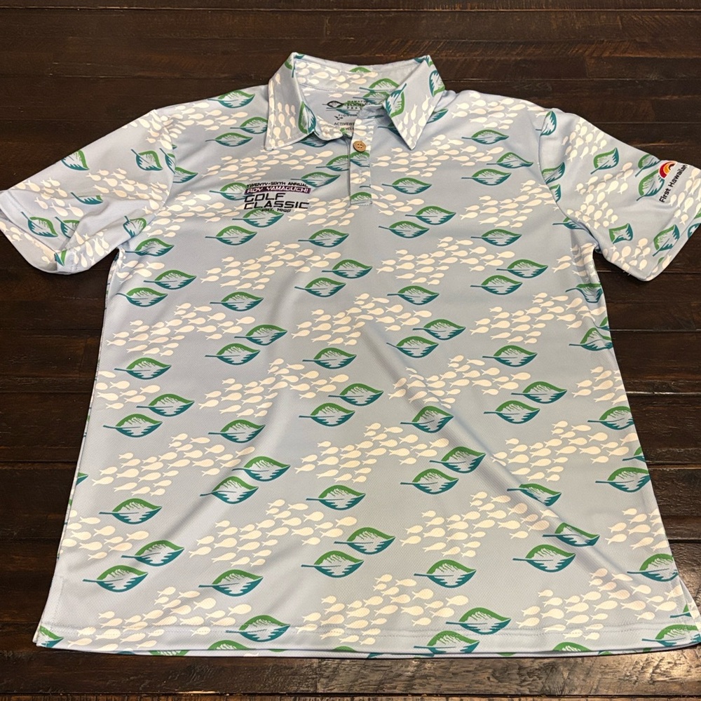 NWOT. Travis Mathew Men's Blue Patterned Polo Shirt